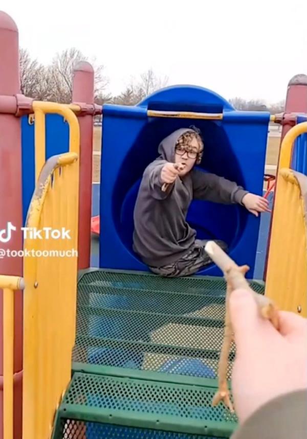 Community members gather in Wiese park for a candlelight vigil at the Perry Middle School and High School complex on January 04.
