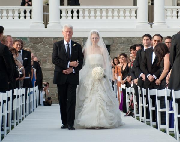 President Bill Clinton walking his daughter Chelsea down the isle