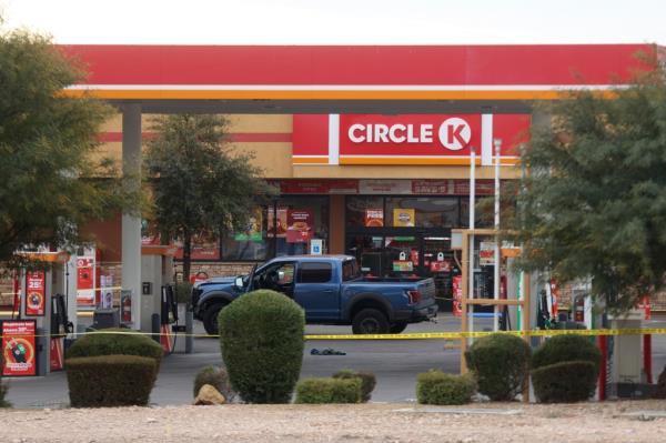 Police investigate the scene in the area of Blue Diamond Road and Durango Drive in Las Vegas, Wednesday, Dec. 27, 2023