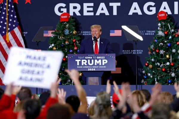 Do<em></em>nald Trump speaks during a campaign event in Waterloo, Iowa, on December 19, 2023.
