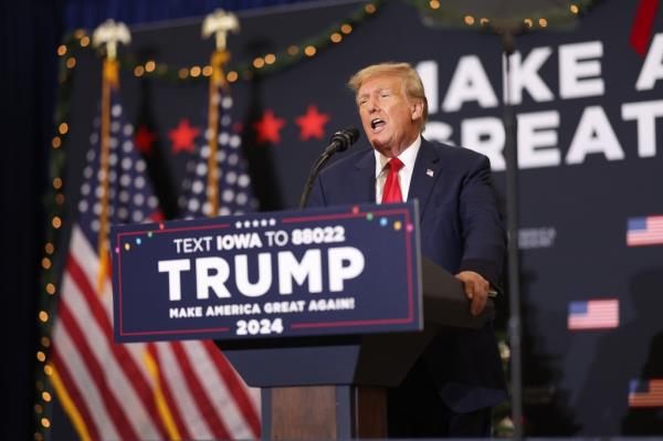Do<em></em>nald Trump speaks to guests at a campaign event on December 19, 2023 in Waterloo, Iowa.