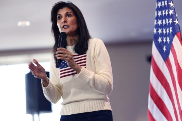 Nikki Haley addresses the crowd during a campaign stop at the Nevada Fairgrounds community building on December 18, 2023 in Nevada, Iowa